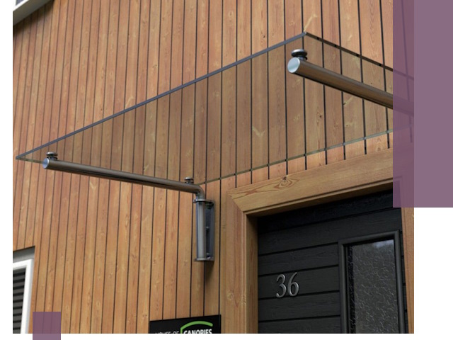 Стеклянные козырьки на входы и фасады в Кургане